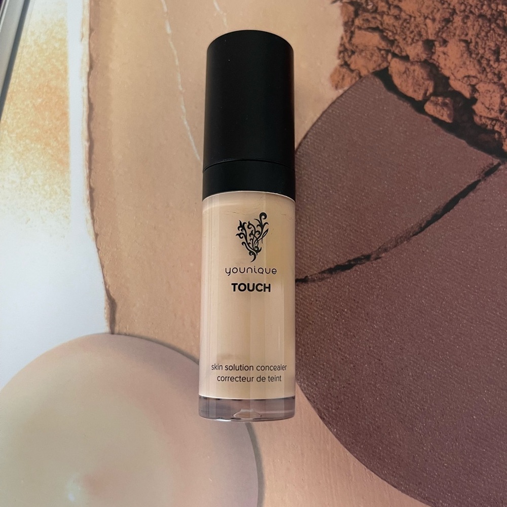 NEW! Younique Touch skin solution concealer.
